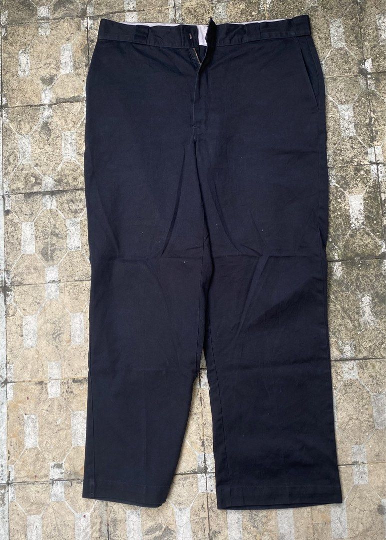 Dickies Black Work Pants (Category: Trousers) located in Imus. Submitted by frootiloots4103 (Listing ID 1470769188, Image 1). Description: - Brand: Dickies - Color: Black - Fit: Straight leg cut - Material: Durable twill fabric - Details: Classic Dickies logo patch on the back pocket - Measurements: Waist 32-33 inches | Length 40 inches | Leg opening 9 inches - Condition: Sturdy construction, perfect for everyday use OPEN FOR NEGO (best if aspack