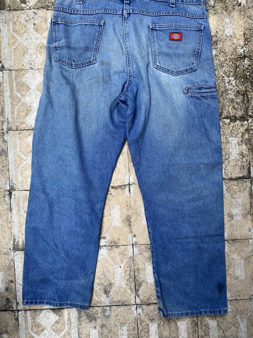 Dickies Double Knee Light Wash Denim Jeans (Category: Jeans) located in Imus. Submitted by frootiloots4103 (Listing ID 1470770557, Image 2). Description: - Brand: Dickies - Style: Double knee denim jeans, relaxed fit - Wash: Light wash with natural thigh fading - Details: Utility pockets and side hammer loop - Condition: Noticeable wear with a small, neat mended rip on the right knee - Vibe: Heavy-duty workwear that is already nicely broken-in OP
