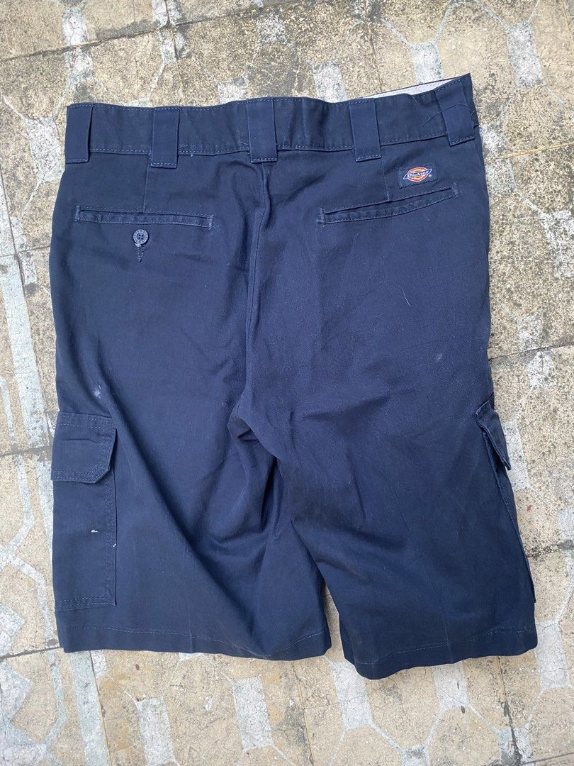 Dickies Flex Regular Fit Navy Cargo Shorts Size 32 (Category: Shorts) located in Imus. Submitted by frootiloots4103 (Listing ID 1470769884, Image 2). Description: - Brand: Dickies - Item: Flex Cargo Shorts - Color: Dark Navy Blue - Size: 32 (Waistband tape marked) - Fit: Regular fit - Pockets: Side cargo pockets and rear welt pockets - Details: Branded button closure and back pocket logo tag - Origin: Made in Honduras OPEN FOR NEGO (best if aspac