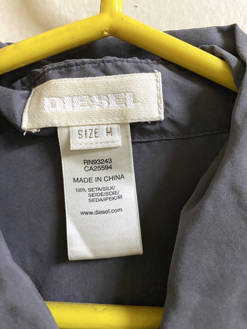 Diesel Grey Silk Long Sleeve Blouse (Category: Blouses) located in Makati City. Submitted by pepperstoremerch (Listing ID 1470930368, Image 3). Description: Diesel Grey Silk Long Sleeve Blouse Size Medium 100% Silk Preloved, good condition Please see pictures D0126 P261029HS.