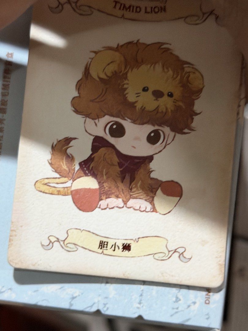 Dimoo Timid Lion Character Card Pop Mart (Category: Designer & Blind Box Toys) located in Manila. Submitted by lebronlabubu (Listing ID 1470747303, Image 1). Description: - Authentic Pop Mart Dimoo character card - Design: Timid Lion (胆小狮) - Condition: Mint, straight from blind box with clean edges and crisp corners - Ideal for completing your set or Lion costume fans - Carefully stored and kept in pristine condition.