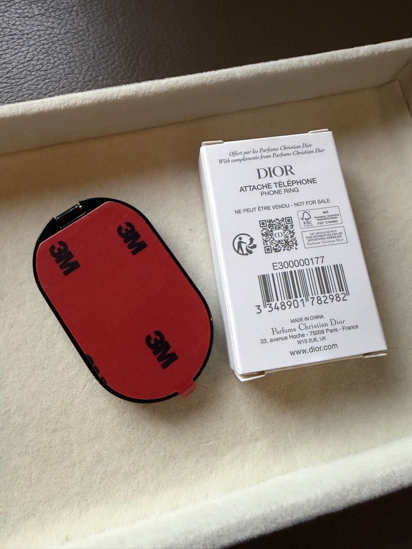 Dior Phone Ring with Mirror Limited Edition (Category: Rings) located in Quezon City. Submitted by madz_jacq (Listing ID 1470831306, Image 3). Description: - 100% Authentic Christian Dior VIP gift from Parfums Christian Dior - Features a handy built-in mirror with protective film still attached - Brand new and unused with original box - Strong 3M adhesive backing intact for secure attachment - Rare 'Ne peut être vendu - not for sale' collector's 