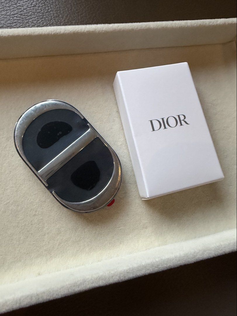 Dior Phone Ring with Mirror Limited Edition (Category: Rings) located in Quezon City. Submitted by madz_jacq (Listing ID 1470831306, Image 1). Description: - 100% Authentic Christian Dior VIP gift from Parfums Christian Dior - Features a handy built-in mirror with protective film still attached - Brand new and unused with original box - Strong 3M adhesive backing intact for secure attachment - Rare 'Ne peut être vendu - not for sale' collector's 