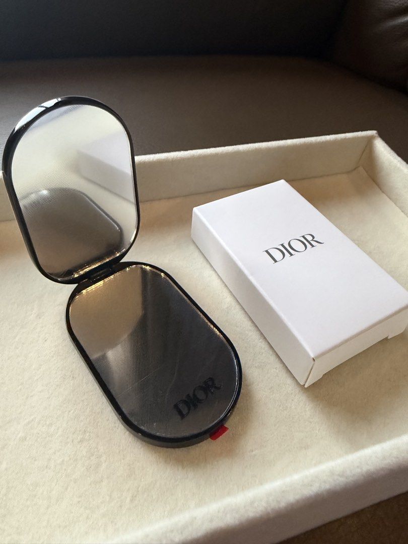 Dior Phone Ring with Mirror Limited Edition (Category: Rings) located in Quezon City. Submitted by madz_jacq (Listing ID 1470831306, Image 2). Description: - 100% Authentic Christian Dior VIP gift from Parfums Christian Dior - Features a handy built-in mirror with protective film still attached - Brand new and unused with original box - Strong 3M adhesive backing intact for secure attachment - Rare 'Ne peut être vendu - not for sale' collector's 