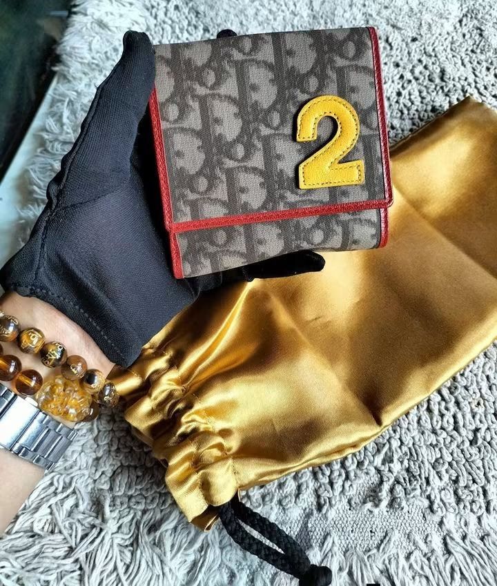 Dior rasta (Category: Wallets & Card holders) located in Angeles City. Submitted by mjshoppingretail (Listing ID 1470855904, Image 1). Description: orig Dior rasta.