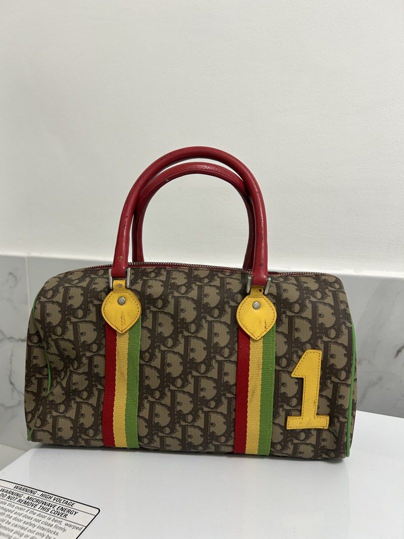 dior rasta boston bag (Category: Luxury Bags & Wallets) located in San Fernando. Submitted by dippedrops (Listing ID 1470897360, Image 1). Description: dior rasta boston bag rank ab.