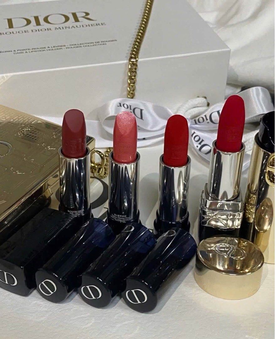 Dior Rouge Dior Minaudiere Lipstick Set (Category: Makeup) located in Leyte. Submitted by modernpersephone (Listing ID 1470823423, Image 1). Description: - Authentic Dior holiday makeup collection in brand new, unused condition - Includes a stunning gold clutch case with a removable chain strap - Comes with 4 refillable lipsticks in different shades and finishes - Beautifully packaged with its original presentation box and white ribbon - All orig