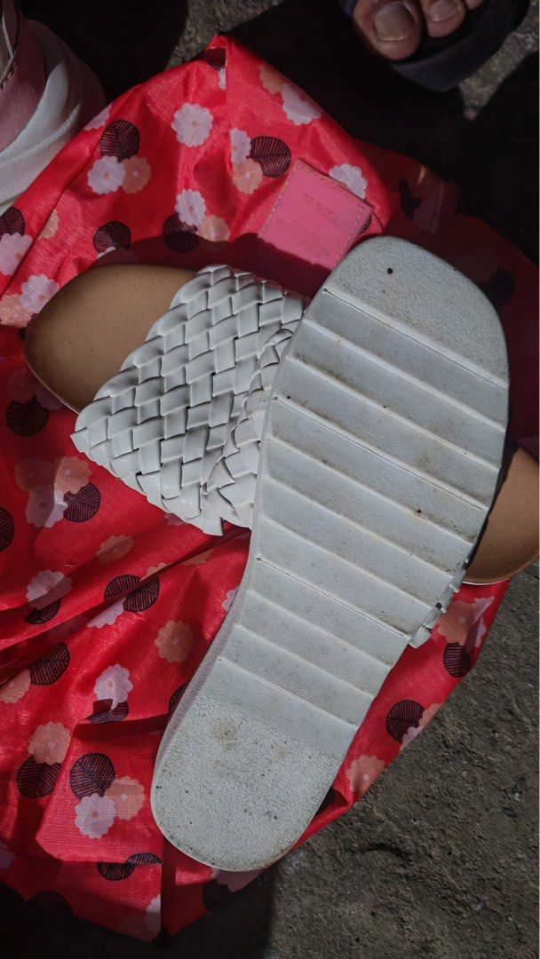 Dirty Laundry White Woven Slide Sandals (Category: Flats & Sandals) located in Baguio. Submitted by markmartin3 (Listing ID 1470886036, Image 1). Description: - Brand: Dirty Laundry - Style: Slip-on platform sandals - Color: White woven top strap, tan footbed with black DL logo, and white grooved sole - Condition: Minor wear visible on the bottom treads - Perfect for: Warm weather and easy styling used twice.