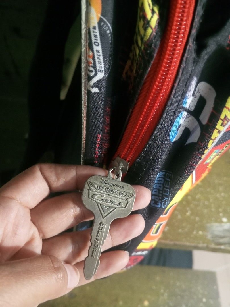 Disney Pixar Cars Lightning McQueen Backpack 95 (Category: Backpacks) located in Pasig City. Submitted by ryuzakiray80620 (Listing ID 1470874286, Image 2). Description: Original price mall 799 - Official Disney Pixar Cars Lightning McQueen kids backpack - Vibrant red molded front featuring iconic number 95 and Rust-eze graphics - Cool black side panels with racing prints and logos - Bright red zipper with a metallic key-shaped Disney Cars branded