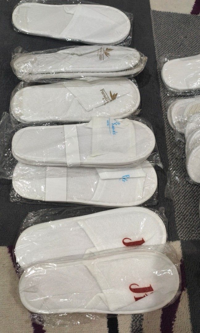 Disposable white Hotel slippers (Category: Slippers & Slides) located in Manila. Submitted by aaronpaula05546 (Listing ID 1470848075, Image 1). Description: -product: white disposable hotel slippers -packaging:individualy in a plastic for hygiene -design plain ,clean,minimalist look -material soft and lightweight for -comfortable indoor wear -perfect for house guest. travel. spa days. and staycations 18pairs.