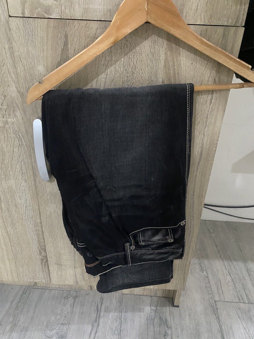 DKNY Jeans Black Denim Size 38x32 (Category: Jeans) located in Manila. Submitted by primomirp (Listing ID 1470835986, Image 2). Description: - Brand: DKNY Jeans - Color: Black denim - Size: 38x32 - Fit: Classic fit - Details: Contrast stitching along seams and pockets - Material: Sturdy imported fabric, made in Vietnam - Condition: Ready to wear.