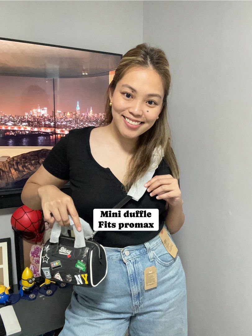 Dkny mini duffle *fits promax (Category: Cross-body Bags) located in Calamba. Submitted by biyanggg (Listing ID 1470834592, Image 1). Description: Plus sf.