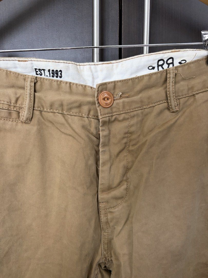 Double RL RRL Tan Cotton Chino Pants (Category: Chinos) located in Urdaneta. Submitted by theoldmanstore (Listing ID 1470747559, Image 3). Description: - Brand: Double RL (RRL) by Ralph Lauren - Color: Classic Tan - Material: 100% premium cotton for maximum comfort - Fit: Classic fit casual trousers - Closure: Button fly with custom branded hardware - Pockets: Back welt pockets with button-closure flaps - Details: Features signature RRL dry goods