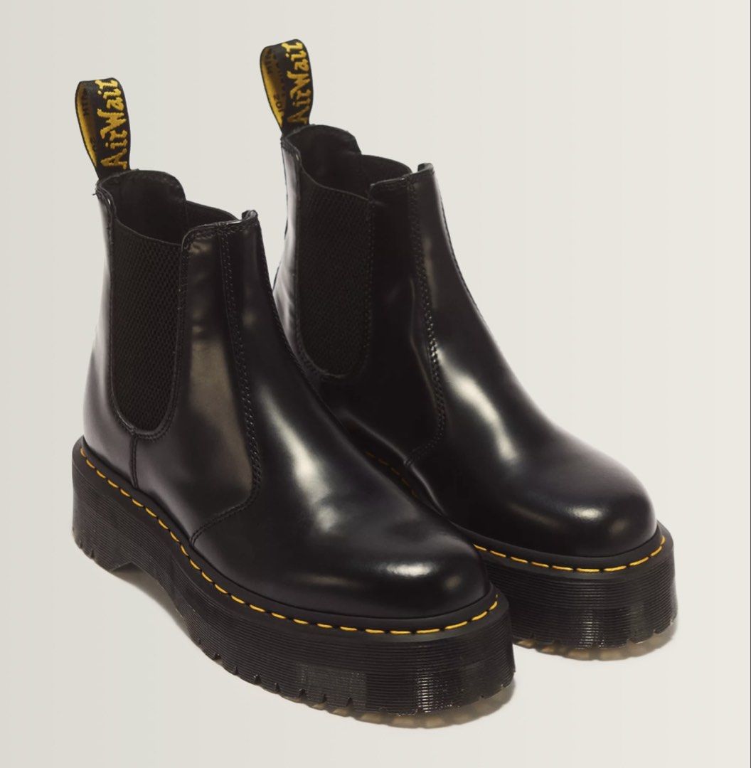 Dr. Martens Chelsea Boots (Category: Boots) located in Manila. Submitted by lancemaverick (Listing ID 1470763975, Image 1). Description: Selling my chelsea boots for declutter - Brand: Dr. Martens - Model: 2976 Quad Platform Chelsea Boots - Color: Black Smooth Leather - Features: Classic elastic gussets for easy pull-on wear - Design: Bold chunky quad sole with signature yellow welt stitching and yellow heel loop - Style: Extra height and a stand