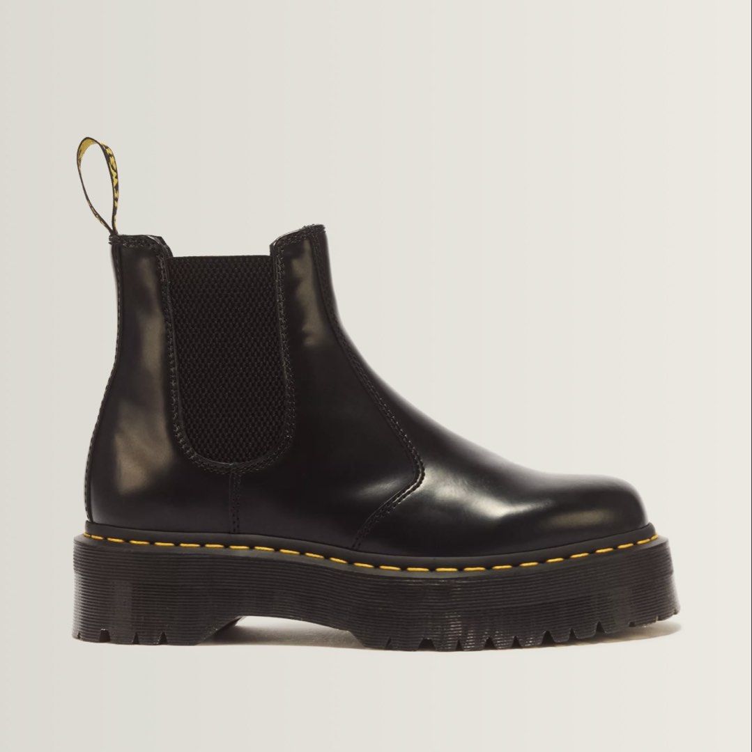 Dr. Martens Chelsea Boots (Category: Boots) located in Manila. Submitted by lancemaverick (Listing ID 1470763975, Image 3). Description: Selling my chelsea boots for declutter - Brand: Dr. Martens - Model: 2976 Quad Platform Chelsea Boots - Color: Black Smooth Leather - Features: Classic elastic gussets for easy pull-on wear - Design: Bold chunky quad sole with signature yellow welt stitching and yellow heel loop - Style: Extra height and a stand