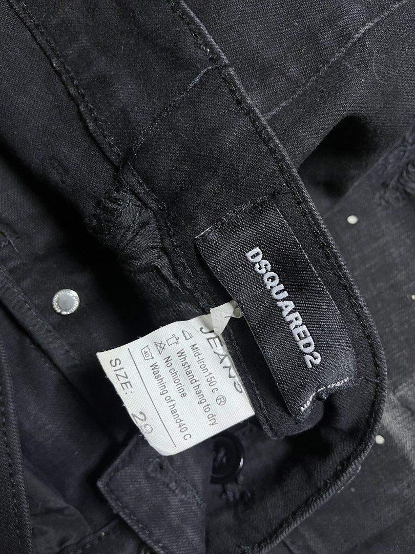 Dsquared2 Black Distressed Studded Jeans Size 29 (Category: Jeans) located in Silang. Submitted by yusthrift (Listing ID 1470815900, Image 3). Description: - Brand: Dsquared2 - Size: 29 15 inches waistline(29-30) 39 inches length 6 inches leg opening - Color: Black denim - Fit: Regular straight cut - Details: Distressed finish with all-over paint splatter and front pocket stud accents - Hardware: Metal button fly with branded zipper pull and inne