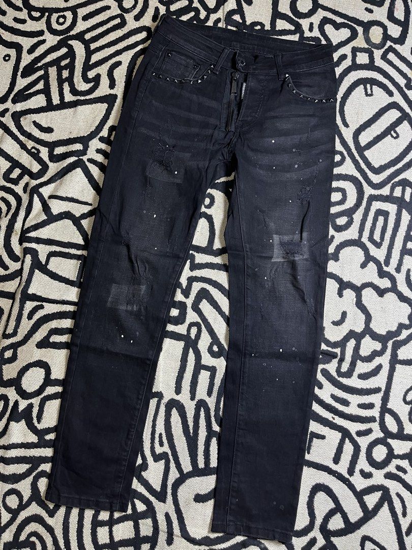 Dsquared2 Black Distressed Studded Jeans Size 29 (Category: Jeans) located in Silang. Submitted by yusthrift (Listing ID 1470815900, Image 1). Description: - Brand: Dsquared2 - Size: 29 15 inches waistline(29-30) 39 inches length 6 inches leg opening - Color: Black denim - Fit: Regular straight cut - Details: Distressed finish with all-over paint splatter and front pocket stud accents - Hardware: Metal button fly with branded zipper pull and inne