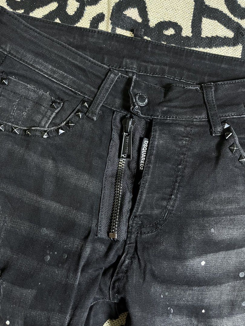 Dsquared2 Black Distressed Studded Jeans Size 29 (Category: Jeans) located in Silang. Submitted by yusthrift (Listing ID 1470815900, Image 2). Description: - Brand: Dsquared2 - Size: 29 15 inches waistline(29-30) 39 inches length 6 inches leg opening - Color: Black denim - Fit: Regular straight cut - Details: Distressed finish with all-over paint splatter and front pocket stud accents - Hardware: Metal button fly with branded zipper pull and inne