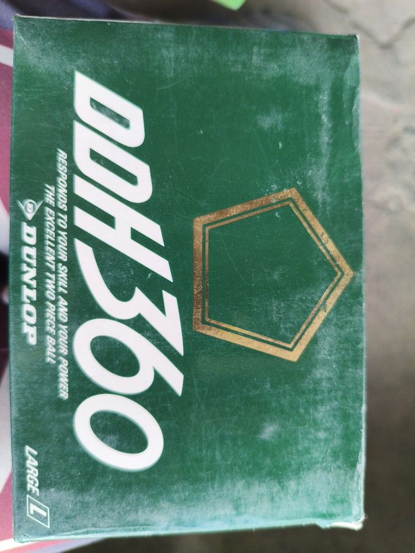 Dunlop DDH 360 Large Golf Balls Box (Category: Golf) located in Manila. Submitted by tonio124 (Listing ID 1470795197, Image 1). Description: - Brand: Dunlop DDH 360 golf balls - Construction: Two-piece design, size large - Color: White golf balls in green outer and inner boxes - Condition: Original boxes included with standard shelf wear - Usage: Perfect for practice sessions or rounds on the course - Location: Ships from the Philippines / Meet-u