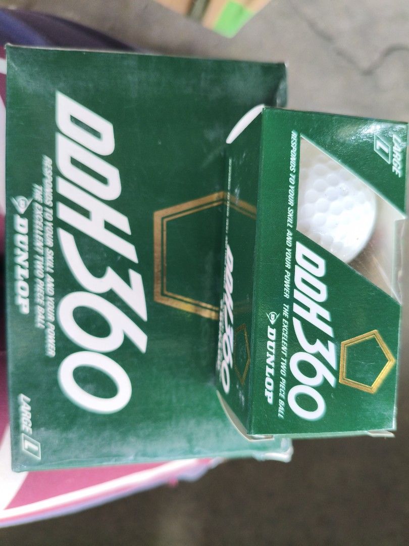 Dunlop DDH 360 Large Golf Balls Box (Category: Golf) located in Manila. Submitted by tonio124 (Listing ID 1470795197, Image 3). Description: - Brand: Dunlop DDH 360 golf balls - Construction: Two-piece design, size large - Color: White golf balls in green outer and inner boxes - Condition: Original boxes included with standard shelf wear - Usage: Perfect for practice sessions or rounds on the course - Location: Ships from the Philippines / Meet-u