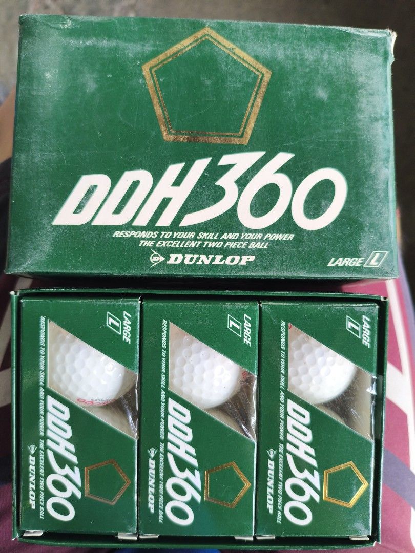 Dunlop DDH 360 Large Golf Balls Box (Category: Golf) located in Manila. Submitted by tonio124 (Listing ID 1470795197, Image 2). Description: - Brand: Dunlop DDH 360 golf balls - Construction: Two-piece design, size large - Color: White golf balls in green outer and inner boxes - Condition: Original boxes included with standard shelf wear - Usage: Perfect for practice sessions or rounds on the course - Location: Ships from the Philippines / Meet-u