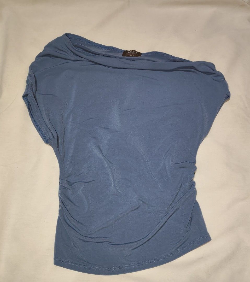 Dusty Blue Ruched Top (Category: Blouses) located in Manila. Submitted by _itswayne (Listing ID 1470837139, Image 1). Description: Size : Xs-s Fabric: Korean ITY| Single-Lined Reference: Bust: 30-33 Waist: 25-28 Length: 19 inches.