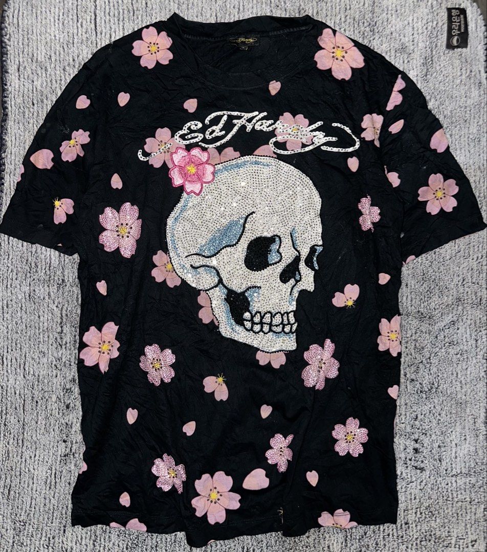 Ed hardy (Category: Tshirts & Polo Shirts ) located in Rosario. Submitted by trippleaaa2020 (Listing ID 1470754110, Image 2). Description: Ed Hardy rhinestone skull and cherry blossom graphic t-shirt Small on tag pasok sa med Dimes 21x27 No issue As new condition Dm if interested Loc mindanao.