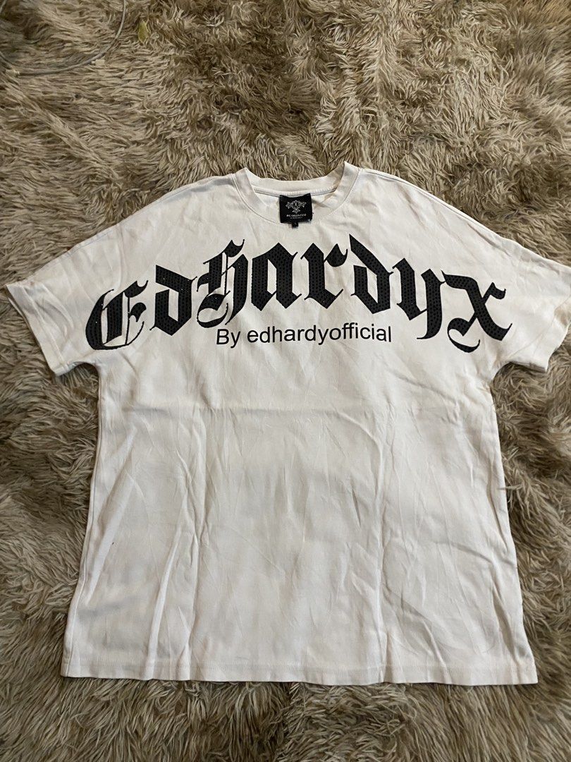 ED HARDYX (Category: Tshirts & Polo Shirts ) located in Aloran. Submitted by thriftnijep.04 (Listing ID 1470812576, Image 1). Description: Excellent Condition Dimes: W22.5 x L28.5 Large on tag Issue: NONE Color rate: 9.8/10.