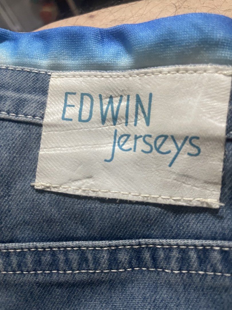 Edwin Jerseys Blue Denim Jeans (Category: Jeans) located in Davao. Submitted by rcgulanes.moon (Listing ID 1470880306, Image 1). Description: - Brand: Edwin Jerseys - Material: Comfortable stretch jersey denim - Waistband: Elasticated with adjustable blue and white tie-dye drawstring - Design: Classic five-pocket style with back pocket stitching and logo tag - Style: Versatile and easy to style for casual everyday wear.