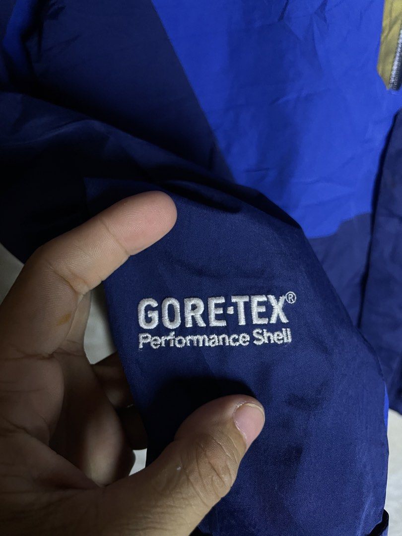 Eider Gore-Tex Performance Shell Waterproof Jacket Blue (Category: Coats, Jackets and Outerwear) located in Molave. Submitted by charlesthrifter (Listing ID 1470854366, Image 3). Description: - Brand: Eider - Material: Gore-Tex Performance Shell (100% waterproof) - Color: Dark blue and bright blue - Design: Hooded with front chest zipper pockets - Details: Embroidered logo on chest and sleeve cuff - Adjustability: Velcro sleeve tabs and hood draw