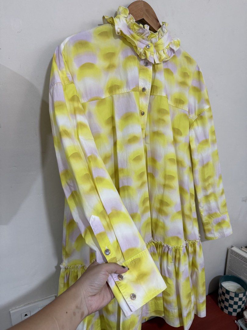 Elegant Yellow Ruffled Dress (Category: Dresses) located in Manila. Submitted by morningthrifters (Listing ID 1470764403, Image 3). Description: Brand: Broadcast from Hongkong 📝Yellow Draped Mini Dress with Ruffle Detail in a yellow tie-dye or printed pattern, styled with a high ruffled collar, front button placket, long sleeves, and a tiered drop-waist hem. 📐 Size Medium 💗 Second time buyers has a free item, follow me to get updated. ⚠️ Pleas