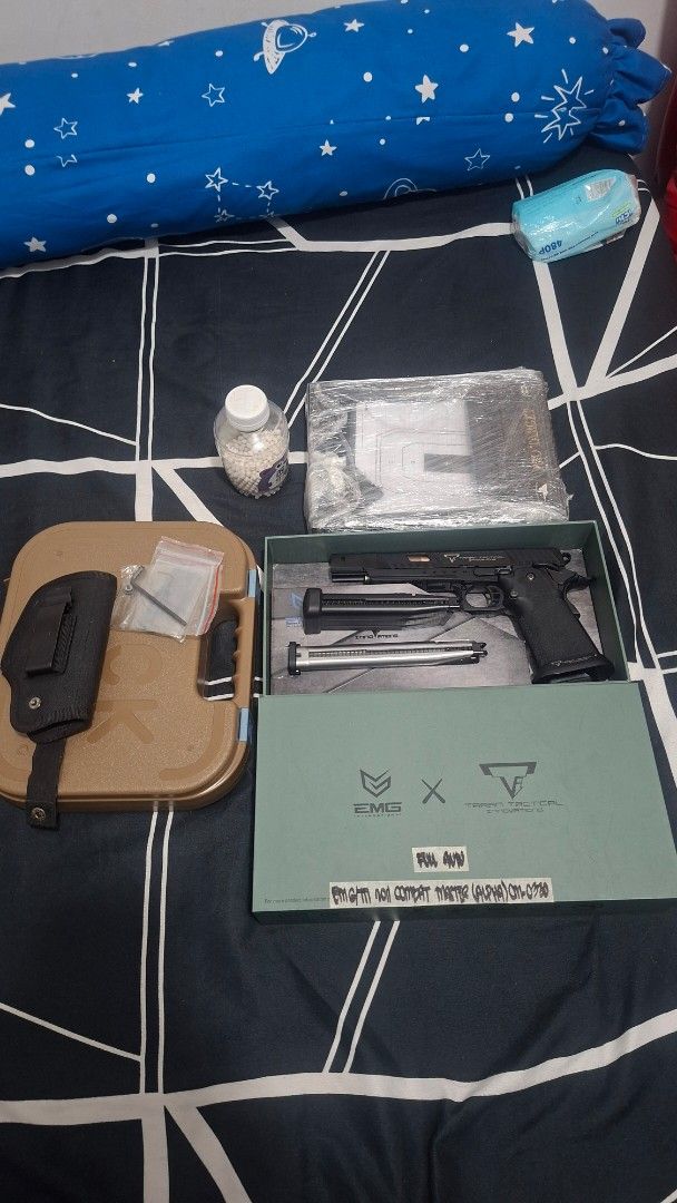 EMG Taran Tactical Innovations Combat Master Airsoft Pistol (Category: Combat Sports) located in Cavite. Submitted by ambon2022 (Listing ID 1470930137, Image 1). Description: - Model: EMG Taran Tactical Innovations Combat Master (Alpha box) - Condition: Fully functional with realistic blowback action - Complete Package: Includes original green box, extra magazines, and holster - Extras: Tools, BBs, and a plastic-wrapped target stand included - Pe