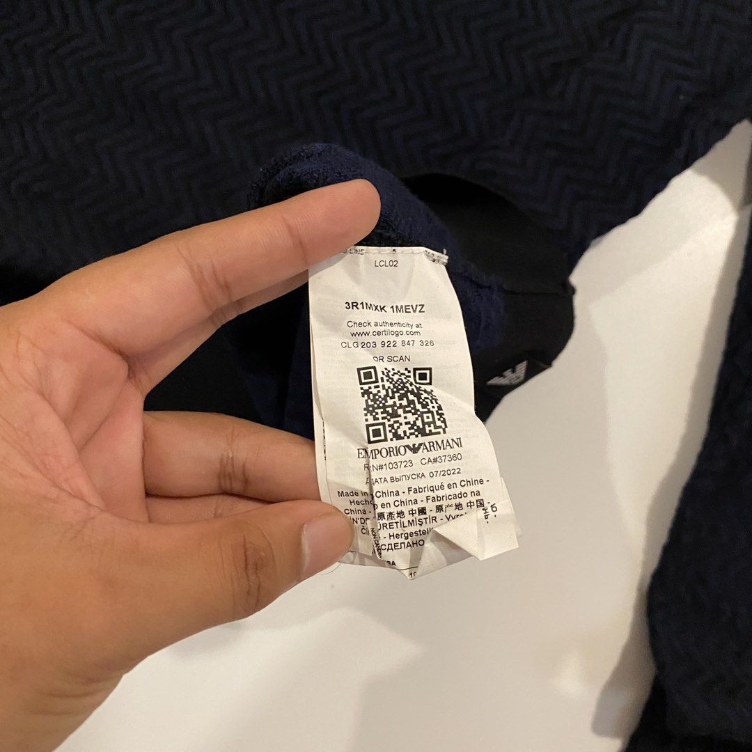 Emporio armani knitted sweater (Category: Coats, Jackets and Outerwear) located in Iloilo. Submitted by joren_ian (Listing ID 1470860217, Image 3). Description: Emporio Armani knitted sweater Stretchable Size:3xl fits to xlarge Dimes (Length×Width):30x22’ ₱550 Condition:likenew Issue:none.