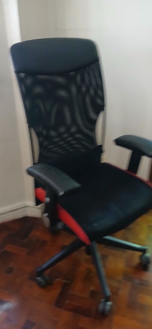 Ergonomic Mesh Office Chair with Red Trim (Category: Office Furniture & Fixtures) located in Pasig City. Submitted by annamariam38525 (Listing ID 1470781644, Image 1). Description: - Ergonomic black mesh office chair with stylish red accents - Breathable mesh back support for all-day comfort during work or study - Adjustable armrests and standard height adjustment lever - Sturdy black star base with smooth-rolling caster wheels.