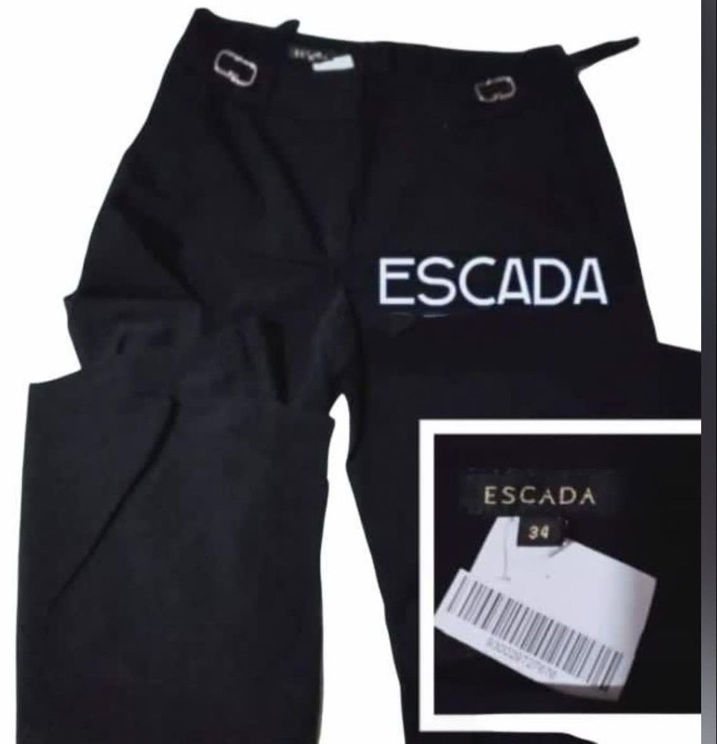 Escada Black Trousers Size 34 (Category: Other Bottoms) located in Paranaque City. Submitted by calm_youngstore7 (Listing ID 1470787663, Image 1). Description: 70% OFF RETAIL! LAST PIECE SALE! - Brand: Escada (Neiman Marcus Exclusive Line) - Size: 34 - Condition: Brand new with original tags attached, never worn - Color: Deep black - Fit: Structured waist with stylish side buckle accents and a wide-leg cut with a clean drape - Ideal for: Professi