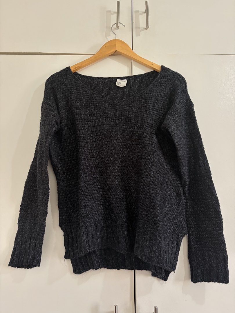 Essentials by Full Tilt Knit Sweater Dark Charcoal (Category: Longsleeves) located in Marikina City. Submitted by _bananahanaa (Listing ID 1470770221, Image 1). Description: - Brand: Essentials by Full Tilt - Color: Dark grey - Material: 84% acrylic, 16% cotton (Made in Bangladesh) - Design: Wide neckline, long sleeves, ribbed hem, high-low hemline - Condition/Style: Cozy everyday piece, super easy to pair with jeans.