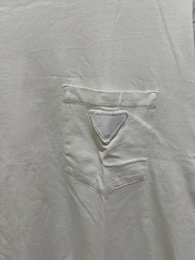Essentials White Pocket Shirt (Category: Formal Shirts) located in Manila. Submitted by thriftpoint99 (Listing ID 1470809725, Image 2). Description: 23x29 No issue Need wash only Excellent condition.