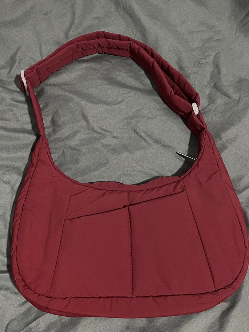 Eve & Adam Cali Puffer Bag Small in Maroon (Category: Cross-body Bags) located in Bulacan. Submitted by love.aya (Listing ID 1470801181, Image 3). Description: Eve & Adam Cali Puffer Bag Small Water-resistant, spacious, durable and packed with multiple pockets for all your essentials. - Color: Maroon - Material: Padded premium water-resistant nylon - Exterior: zipper closure, front pocket, back pocket - Interior: water-resistant lining, 1 zipper 