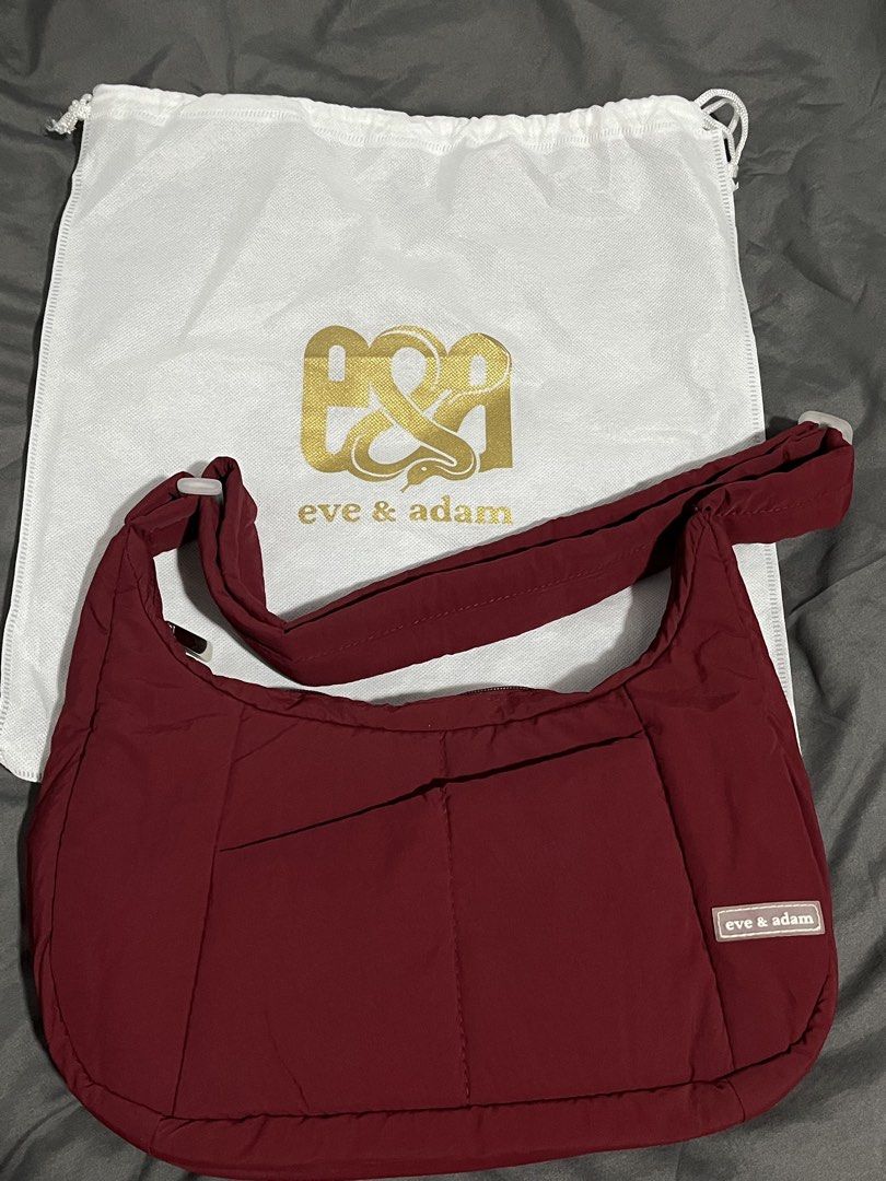 Eve & Adam Cali Puffer Bag Small in Maroon (Category: Cross-body Bags) located in Bulacan. Submitted by love.aya (Listing ID 1470801181, Image 1). Description: Eve & Adam Cali Puffer Bag Small Water-resistant, spacious, durable and packed with multiple pockets for all your essentials. - Color: Maroon - Material: Padded premium water-resistant nylon - Exterior: zipper closure, front pocket, back pocket - Interior: water-resistant lining, 1 zipper 