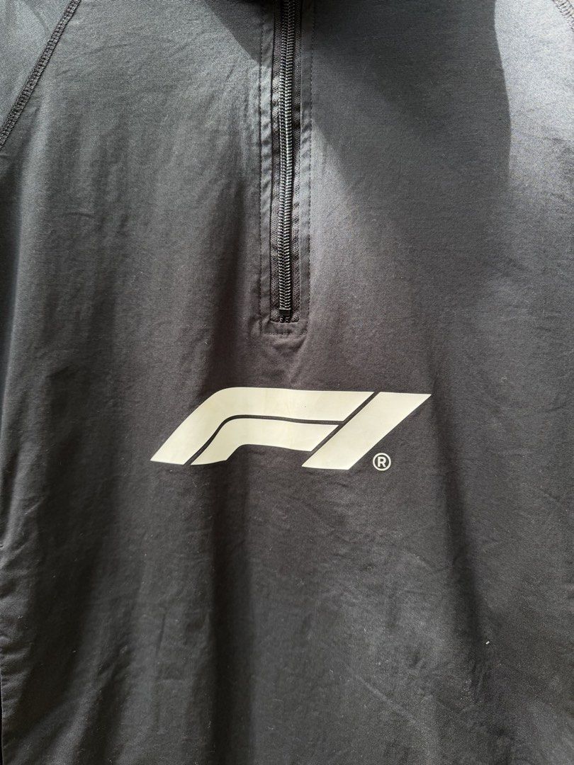 F1 QZIP JACKET (Category: Coats, Jackets and Outerwear) located in Quezon City. Submitted by ree3_dr0pp2k25 (Listing ID 1470760824, Image 3). Description: 22.5x25.5 No issue on print and fabric Bubble gum on sleeve but removable Excellent condition! Water repellent .