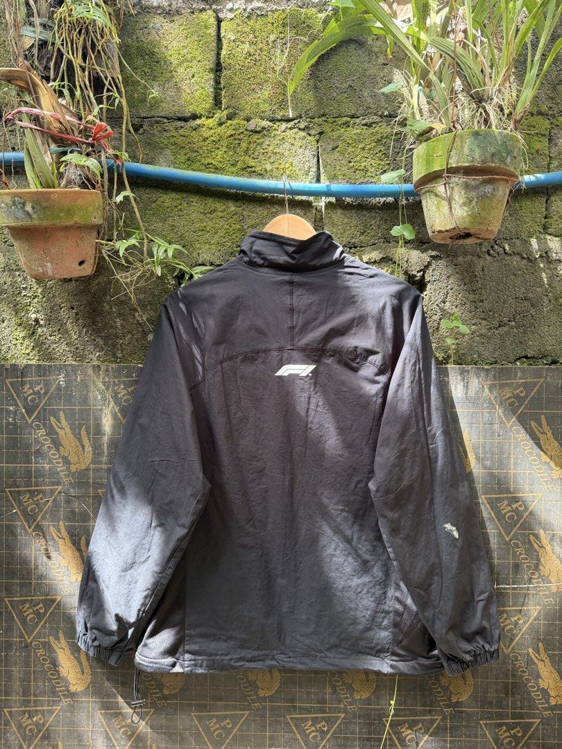 F1 QZIP JACKET (Category: Coats, Jackets and Outerwear) located in Quezon City. Submitted by ree3_dr0pp2k25 (Listing ID 1470760824, Image 2). Description: 22.5x25.5 No issue on print and fabric Bubble gum on sleeve but removable Excellent condition! Water repellent .
