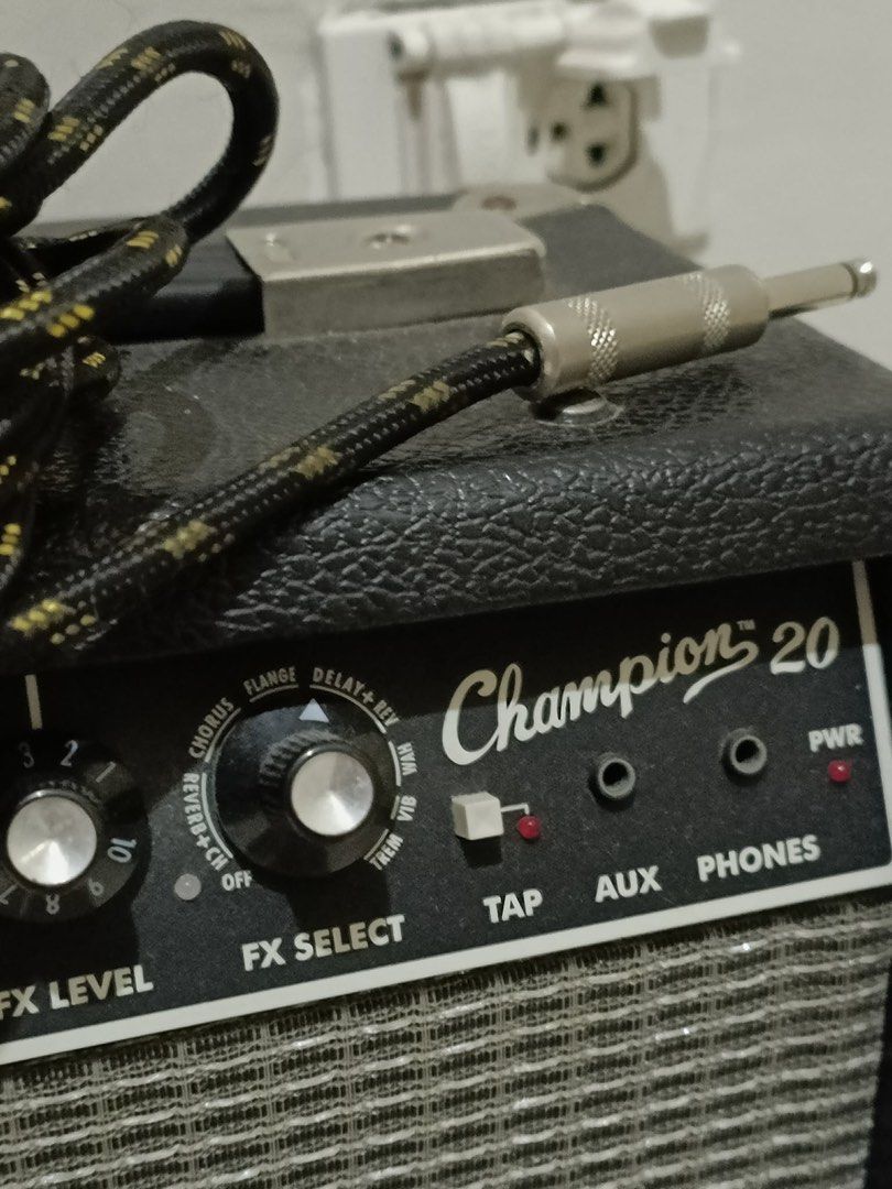 Fender Champion 20 (Category: Musical Instruments) located in Calamba. Submitted by chwemaxi (Listing ID 1470767115, Image 1). Description: - 20W solid-state amplifier - 8” Fender Special Design speaker - Multiple amp voicings - Built-in effects: Reverb, Delay, Chorus, Tremolo & more - AUX input & headphone output - Gain, Volume, Treble & Bass controls Excellent condition, no cosmetic damage. Well-maintained and fully functional. .