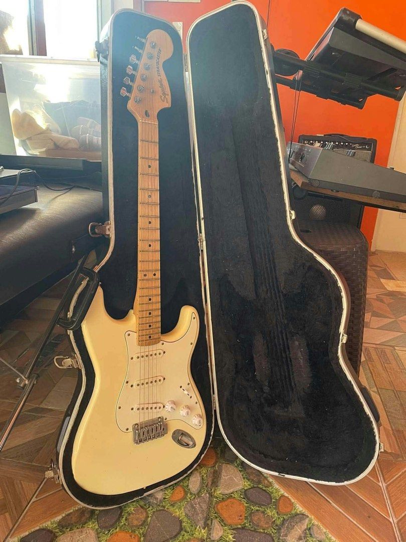 Fender Stratocaster Affinity Series (Category: Musical Instruments) located in Santa Rosa. Submitted by _joannealexis (Listing ID 1470745195, Image 3). Description: - Model: Squier Stratocaster electric guitar - Finish: Classic cream with white pickguard - Neck: Maple fretboard - Pickups: Standard three single-coil pickups - Included: Sturdy Fender hard shell case - Condition: Great setup, ideal for beginners and gigging musicians.