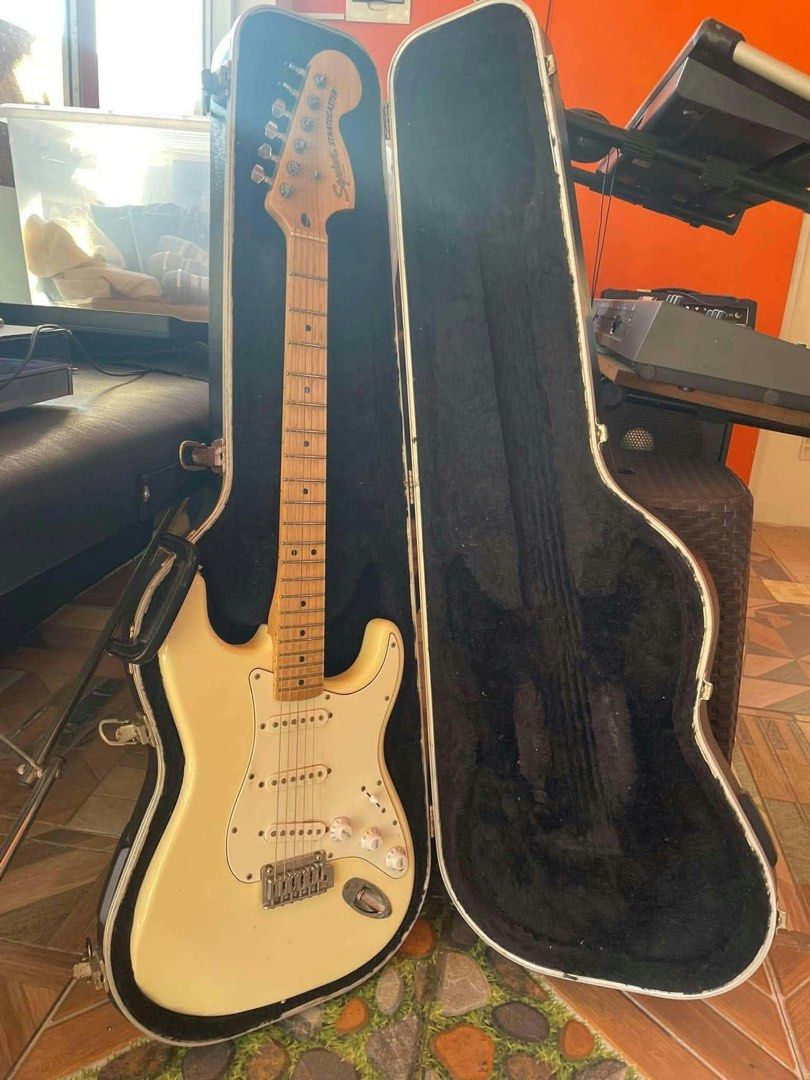 Fender Stratocaster Affinity Series (Category: Musical Instruments) located in Santa Rosa. Submitted by _joannealexis (Listing ID 1470745195, Image 2). Description: - Model: Squier Stratocaster electric guitar - Finish: Classic cream with white pickguard - Neck: Maple fretboard - Pickups: Standard three single-coil pickups - Included: Sturdy Fender hard shell case - Condition: Great setup, ideal for beginners and gigging musicians.