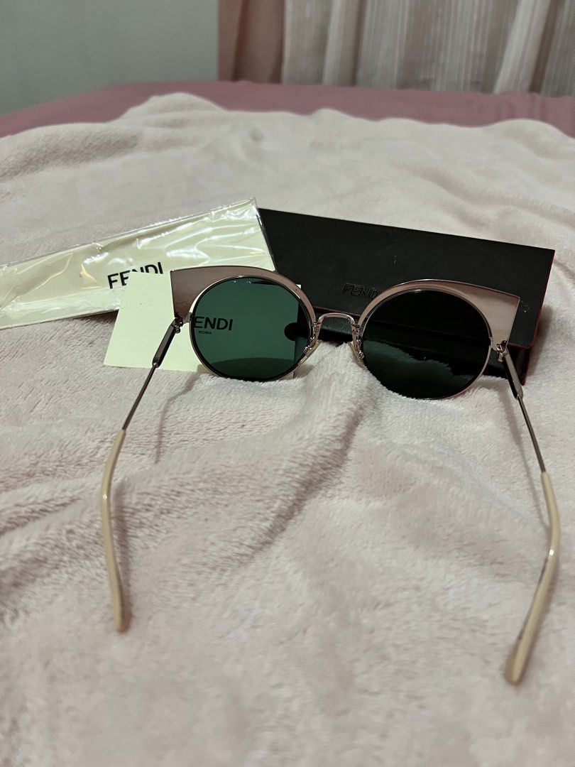 Fendi EyeShine cat-eye sunglasses (Category: Sunglasses & Eyewear) located in Quezon City. Submitted by rose.g (Listing ID 1470809988, Image 2). Description: Brand New Color Code: Pink Mirror / Rose Gold Complete set 📍Katipunan Ave., QC.