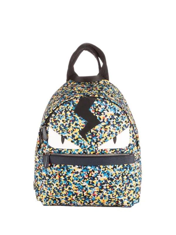 Fendi Monster Mini Backpack Multi-color Camo Lightning Bolt (Category: Backpacks) located in Manila. Submitted by madecuratedwithlove11 (Listing ID 1470887627, Image 1). Description: Fendi mini backpack in multi-color camouflage nylon. Front zipped pocket, iconic white leather monster eyes, and black leather lightning bolt applique. Top handle and adjustable shoulder straps. Interior black lining with Fendi Made in Italy leather tag. Hardware sho