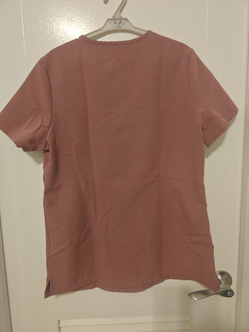 FIGS Technical Collection Scrubs Set Small Mauve (Category: Sets or Coordinates) located in Quezon City. Submitted by capyboora (Listing ID 1470862329, Image 3). Description: - Brand: FIGS (Technical Collection) - Size: Small - Color: Dusty Pink / Mauve - Top: Short-sleeve V-neck with chest pocket - Bottoms: Matching jogger pants with drawstring waist and multiple pockets - Condition: Excellent, clean, no stains or damage - Fabric: Super comforta