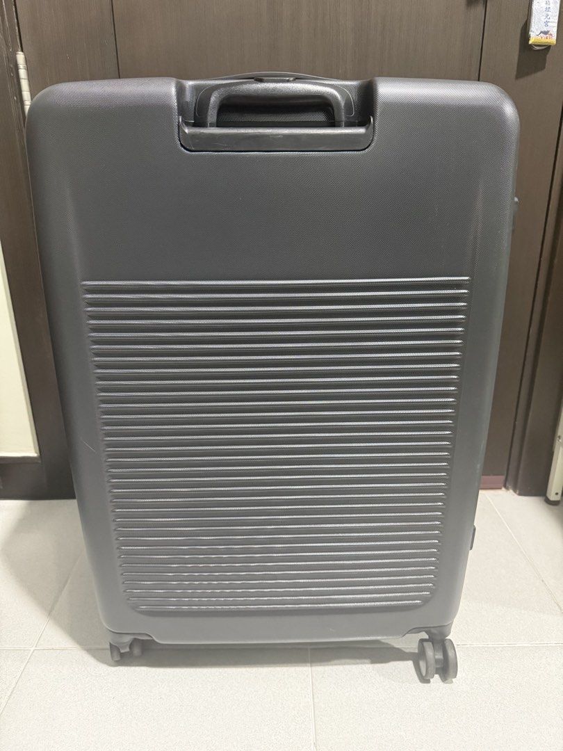 Flylite Hardcase Luggage Dark Grey (Category: Luggage) located in Makati City. Submitted by katdestash (Listing ID 1470764272, Image 3). Description: - Brand/Model: Flylite Hardshell Luggage - Color: Dark Grey - Size: Large Standard check-in size; approx 65cmx30cmx45cm - Weight: only 4.58kg when empty - Wheels: 4 smooth-rolling 360-degree spinner wheels - Security: Integrated TSA007 combination lock - Exterior: Durable textured hardshell finish w