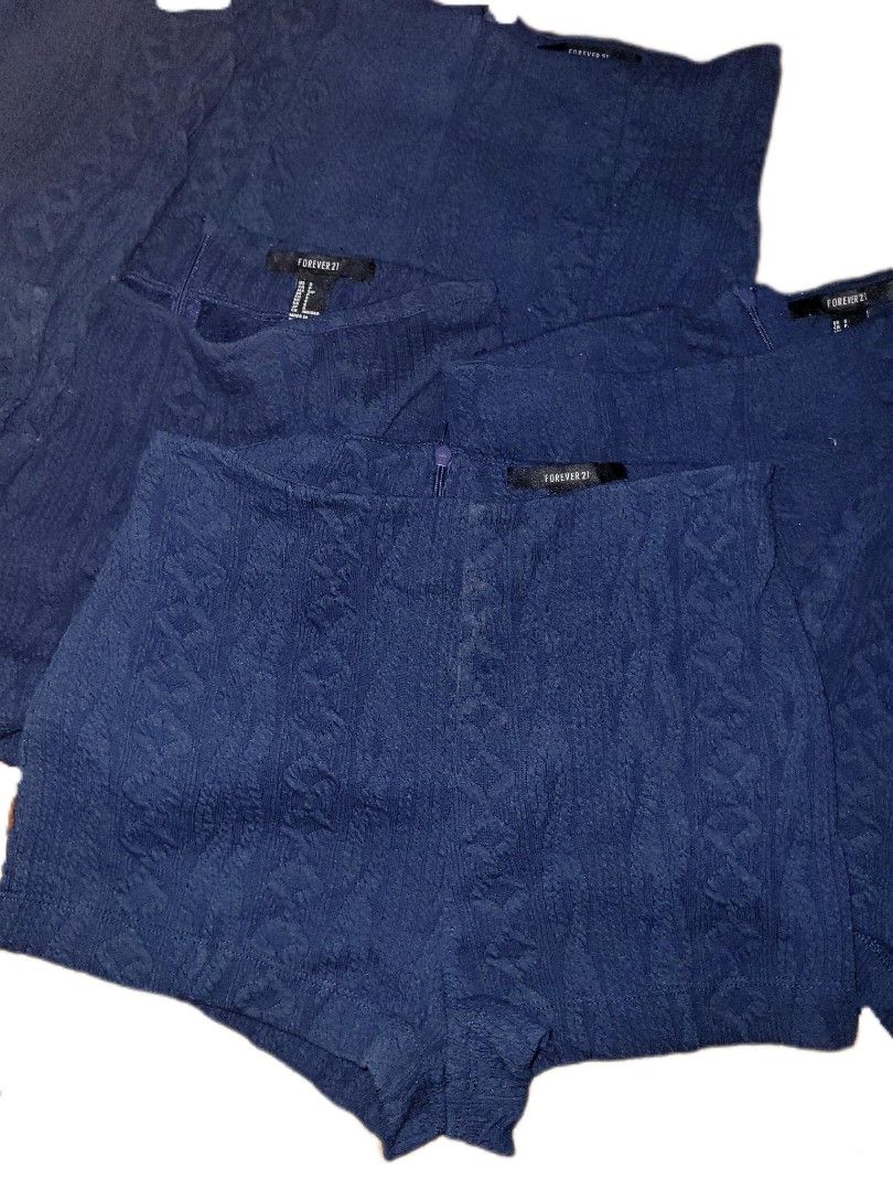 Forever 21 knitted fitted shorts (7pcs) (Category: Shorts) located in Batangas. Submitted by dramaticcloset (Listing ID 1470855661, Image 2). Description: 7pcs of bnew knitted forever21 shorts dark blue color size small on tag but very stretchy material highwaisted and mini.
