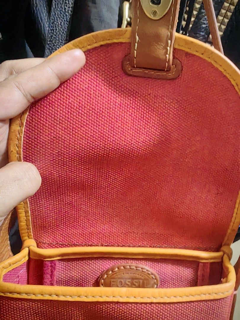 Fossil leather and canvas sling bag (Category: Cross-body Bags) located in Davao. Submitted by thefrugalshop (Listing ID 1470629100, Image 3). Description: well-used but in presentable condition. all leather and canvas. .